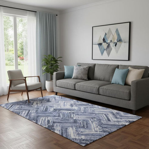 5' X 8' Blue And Ivory Chevron Washable Area Rug With UV Protection