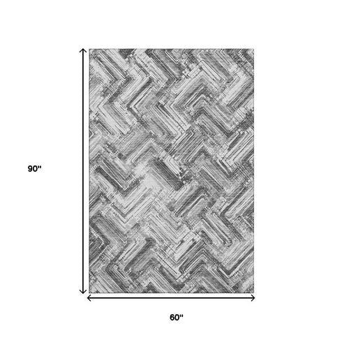 5' X 8' Gray And Ivory Chevron Washable Area Rug With UV Protection