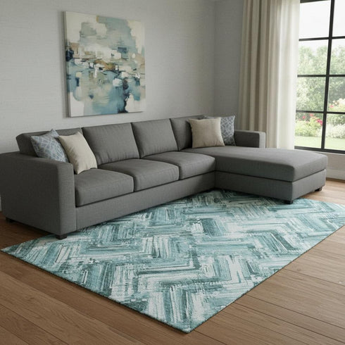 8' X 10' Teal And Ivory Chevron Washable Area Rug With UV Protection