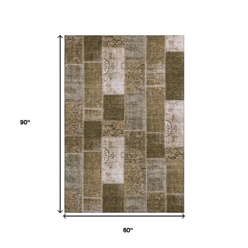 5' X 8' Brown And Ivory Patchwork Washable Area Rug With UV Protection