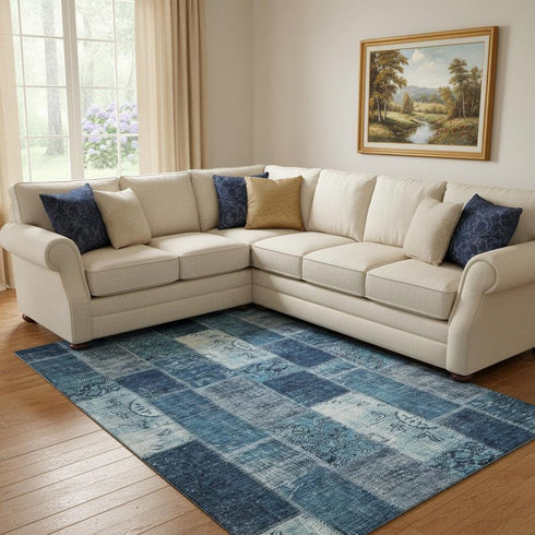 8' X 10' Blue And Ivory Patchwork Washable Area Rug With UV Protection