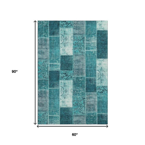 5' X 8' Teal And Ivory Patchwork Washable Area Rug With UV Protection