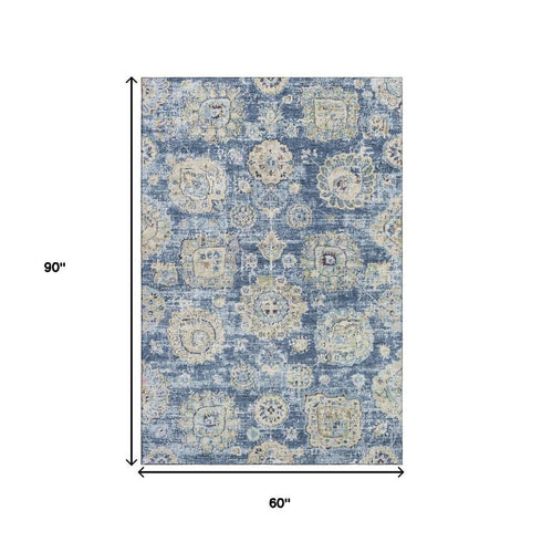 5' X 8' Blue Ivory And Gold Floral Washable Area Rug With UV Protection