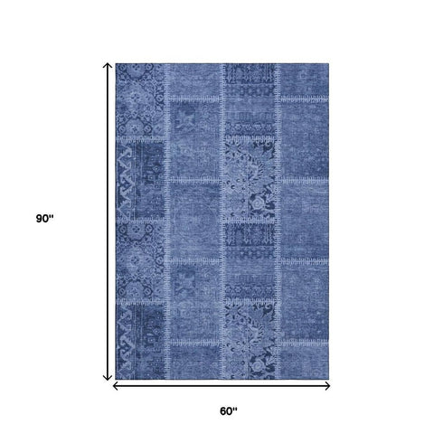 5' X 8' Navy Blue And Ivory Patchwork Washable Area Rug With UV Protection