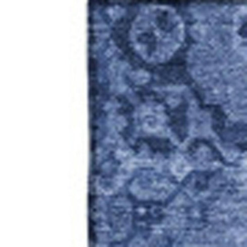 8' X 10' Navy Blue And Ivory Patchwork Washable Area Rug With UV Protection