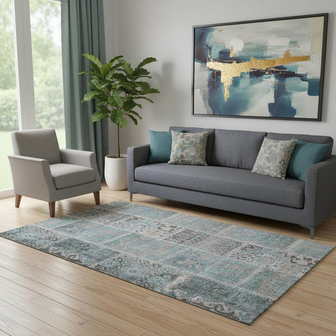 5' X 8' Teal And Beige Patchwork Washable Area Rug With UV Protection