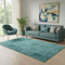 5' X 8' Turquoise And Aqua Patchwork Washable Area Rug With UV Protection