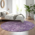 8' Purple And Ivory Floral Washable Round Rug With UV Protection
