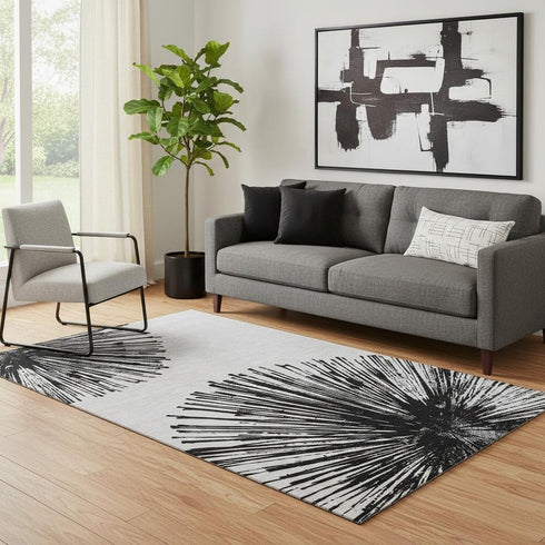 5' X 8' Black And Ivory Abstract Washable Area Rug With UV Protection