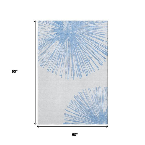 5' X 8' Denim Blue And Ivory Abstract Washable Area Rug With UV Protection