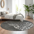 8' Charcoal And Ivory Abstract Washable Round Rug With UV Protection