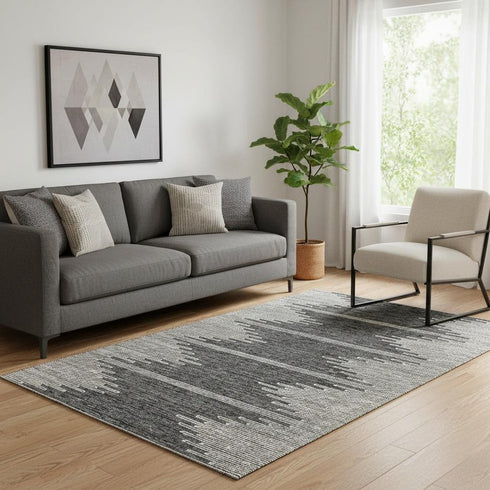 5' X 8' Charcoal And Ivory Abstract Washable Area Rug With UV Protection