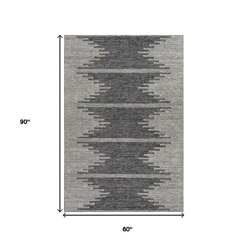 5' X 8' Charcoal And Ivory Abstract Washable Area Rug With UV Protection