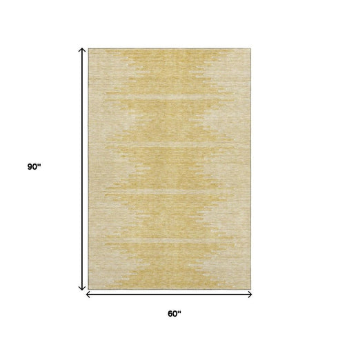 5' X 8' Gold And Ivory Abstract Washable Area Rug With UV Protection