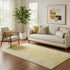 5' X 8' Gold And Ivory Abstract Washable Area Rug With UV Protection