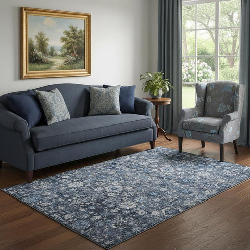 5' X 8' Blue And Ivory Oriental Washable Area Rug With UV Protection