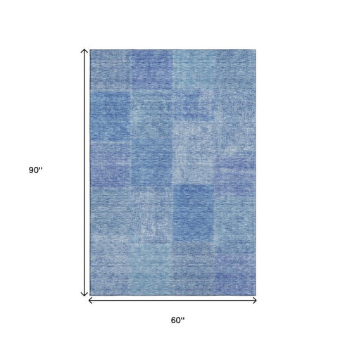 9' X 12' Denim Blue And Ivory Patchwork Washable Area Rug With UV Protection