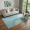 5' X 8' Teal And Ivory Geometric Washable Area Rug With UV Protection