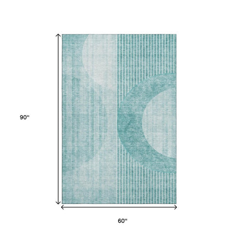 5' X 8' Teal And Ivory Geometric Washable Area Rug With UV Protection