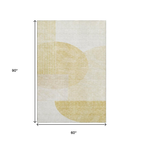 9' X 12' Gold And Ivory Geometric Washable Area Rug With UV Protection