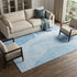 9' X 12' Blue And Ivory Abstract Washable Area Rug With UV Protection