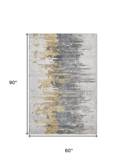 9' X 12' Ivory Gold And Gray Abstract Washable Area Rug With UV Protection