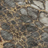 9' X 12' Ivory Gray And Gold Abstract Distressed Washable Area Rug With UV Protection