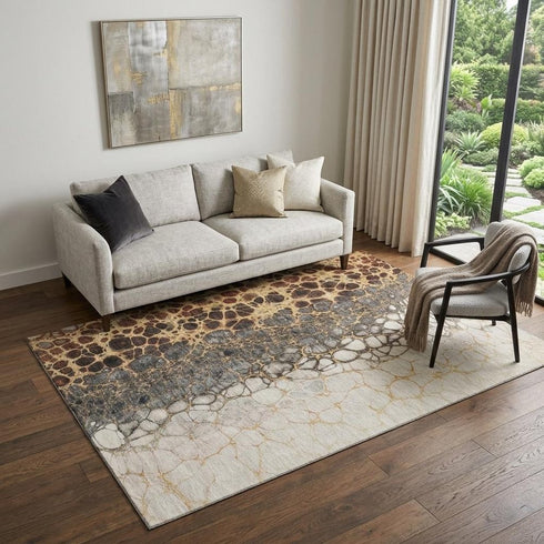 9' X 12' Ivory Gray And Gold Abstract Distressed Washable Area Rug With UV Protection