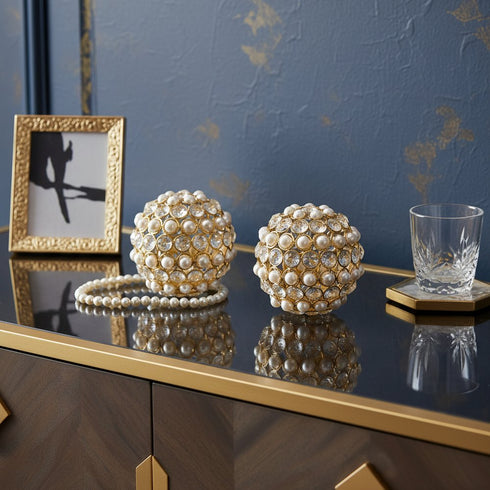 Set of Two Gold Ivory And Pearl Faux Crystal And Metal Decorative Orbs