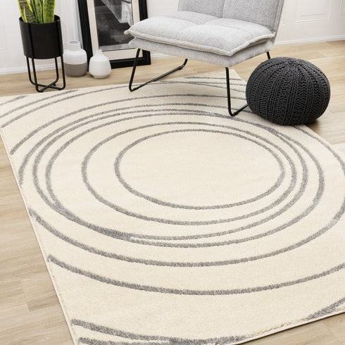 8' X 11' Cream And Gray Abstract Area Rug