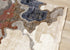 5' X 8' Beige Blue And Black Abstract Area Rug