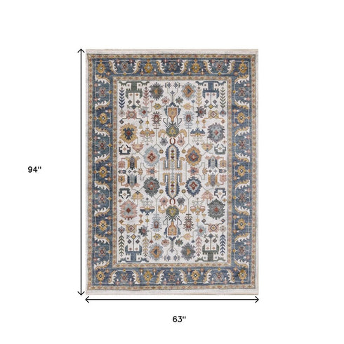 5' X 8' Cream Blue And Green Medallion Area Rug