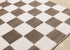 5' X 8' Brown And White Geometric Area Rug