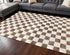 5' X 8' Brown And White Geometric Area Rug