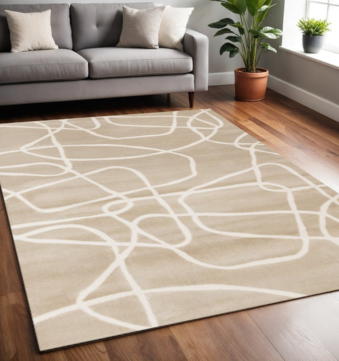 8' X 11' Cream And Tan Abstract Area Rug