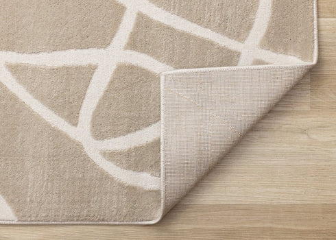 8' X 11' Cream And Tan Abstract Area Rug