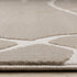 8' X 11' Cream And Tan Abstract Area Rug