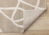 8' X 11' Cream And Tan Abstract Area Rug