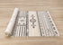 5' X 8' Cream And Black Tribal Area Rug
