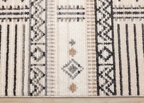 5' X 8' Cream And Black Tribal Area Rug
