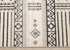 5' X 8' Cream And Black Tribal Area Rug