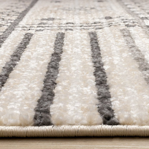 5' X 8' Cream And Black Tribal Area Rug