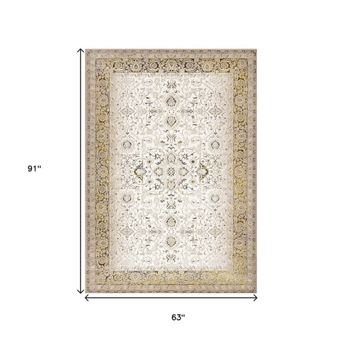 5' X 8' Cream Black And Tan Medallion Area Rug