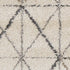 5' X 8' Cream And Gray Tribal Area Rug