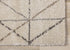 5' X 8' Cream And Gray Tribal Area Rug