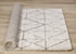 5' X 8' Cream And Gray Tribal Area Rug