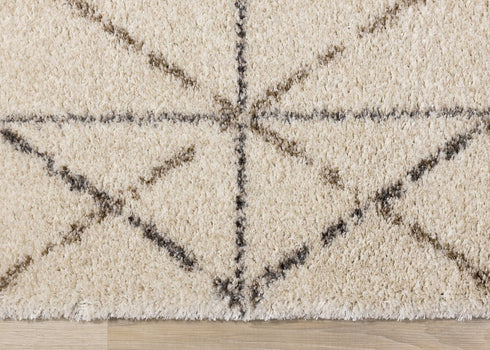 5' X 8' Cream And Gray Tribal Area Rug