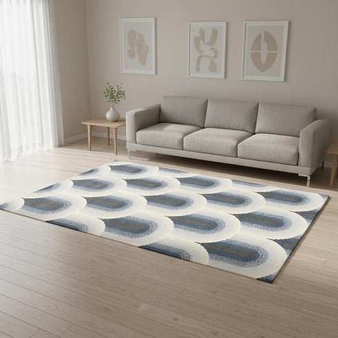 5' X 8' Cream And Blue Geometric Area Rug