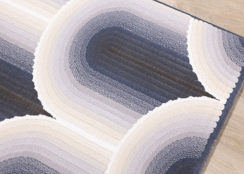 5' X 8' Cream And Blue Geometric Area Rug