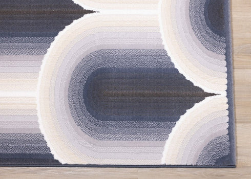 5' X 8' Cream And Blue Geometric Area Rug